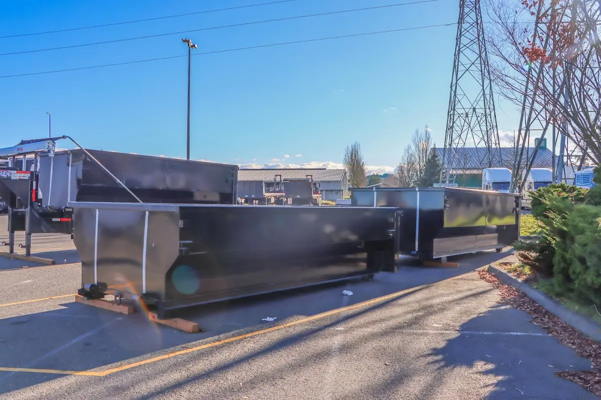 Roll-off dumpster ready for waste disposal at job site for Yard Waste Dumpster Rental in Washington